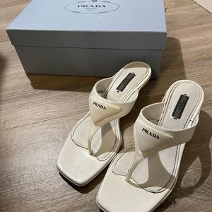white PRADA logo low heels